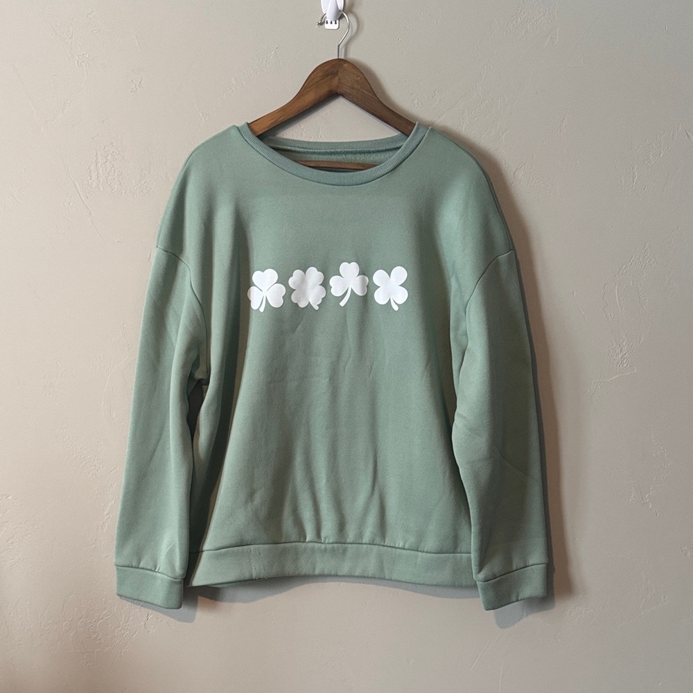 Green Sweatshirt with White Floral Design